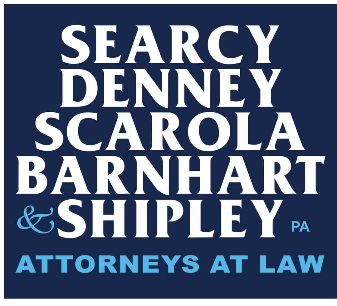 Law firm sign for Searcy Denney & Shipley Attorneys at Law.